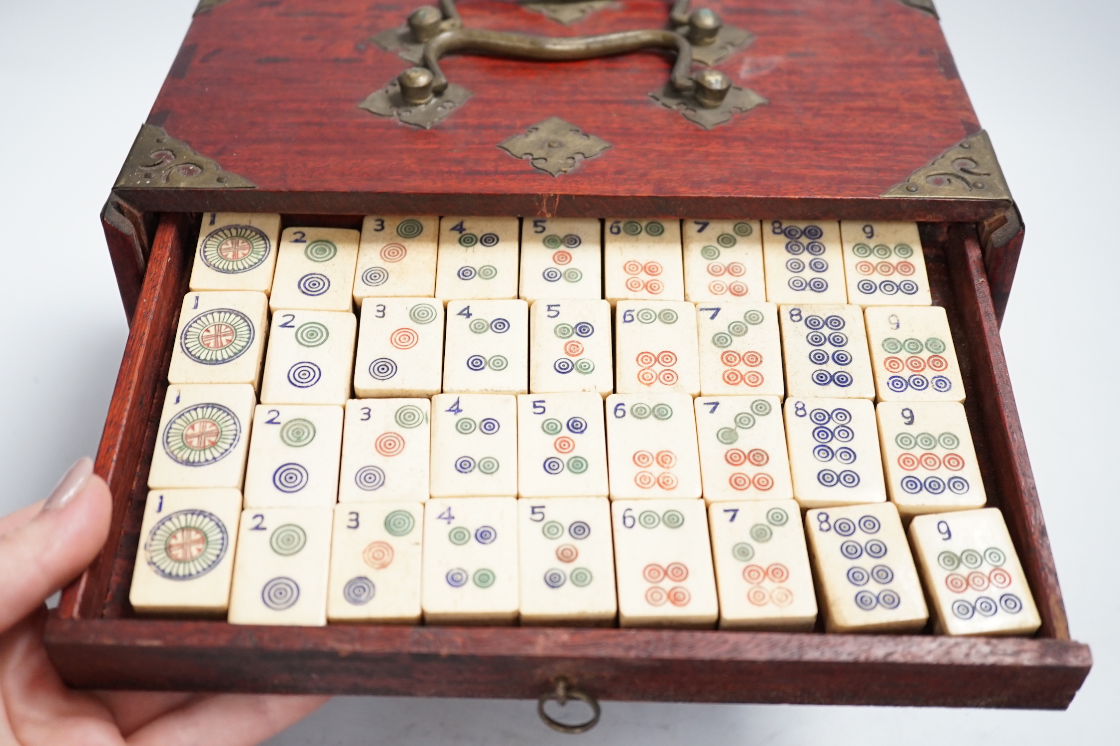 A Chinese Mah jong set, 24cm wide